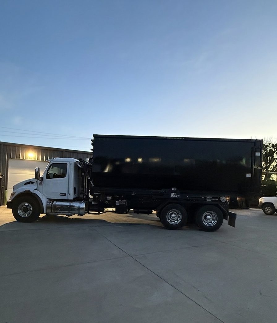 Roll-off dumpster delivery truck serving the Shawnee area
